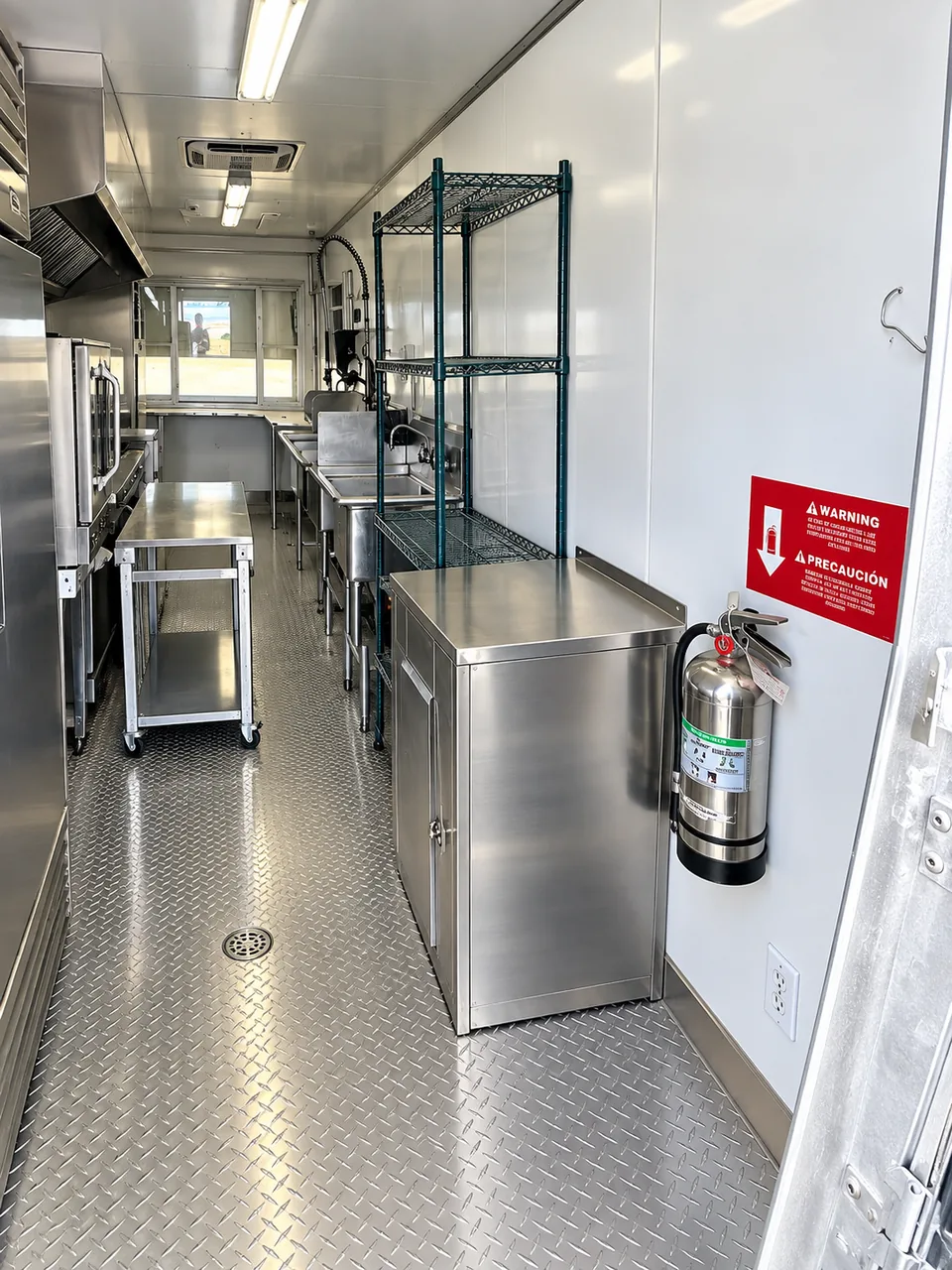 Cooking line inside a 24-foot mobile kitchen trailer